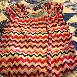 girls pink white and black shirt